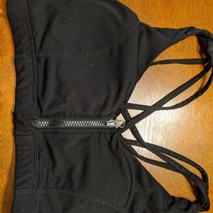 Black zip up sports bra. M.
